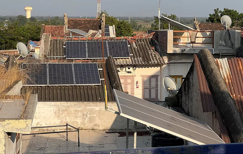 Modhera Gujarat solar-powered village with solar panels and battery storage